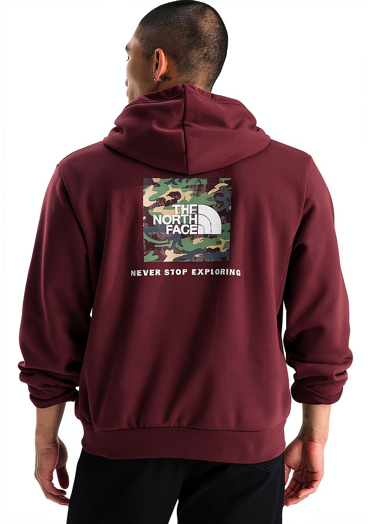 The North Face Box Camo Hoodie in Gravel color on a man outdoors