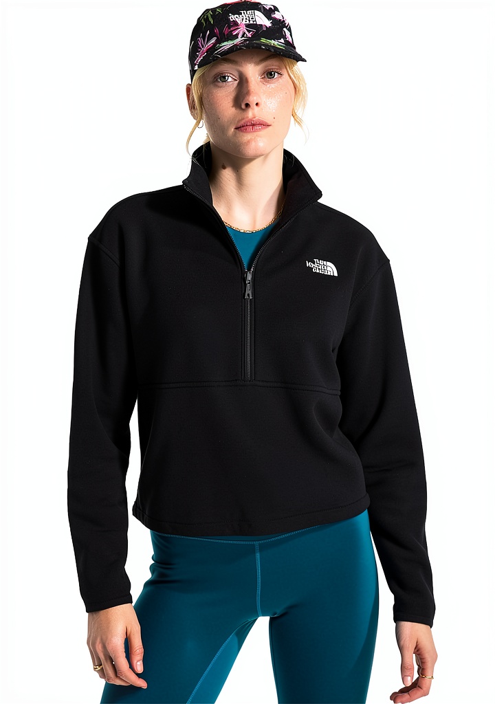 The North Face Glacier Fleece Half Zip Womens Jacket being examined on a wooden table